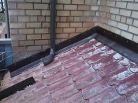 Примыкание кровли к стене